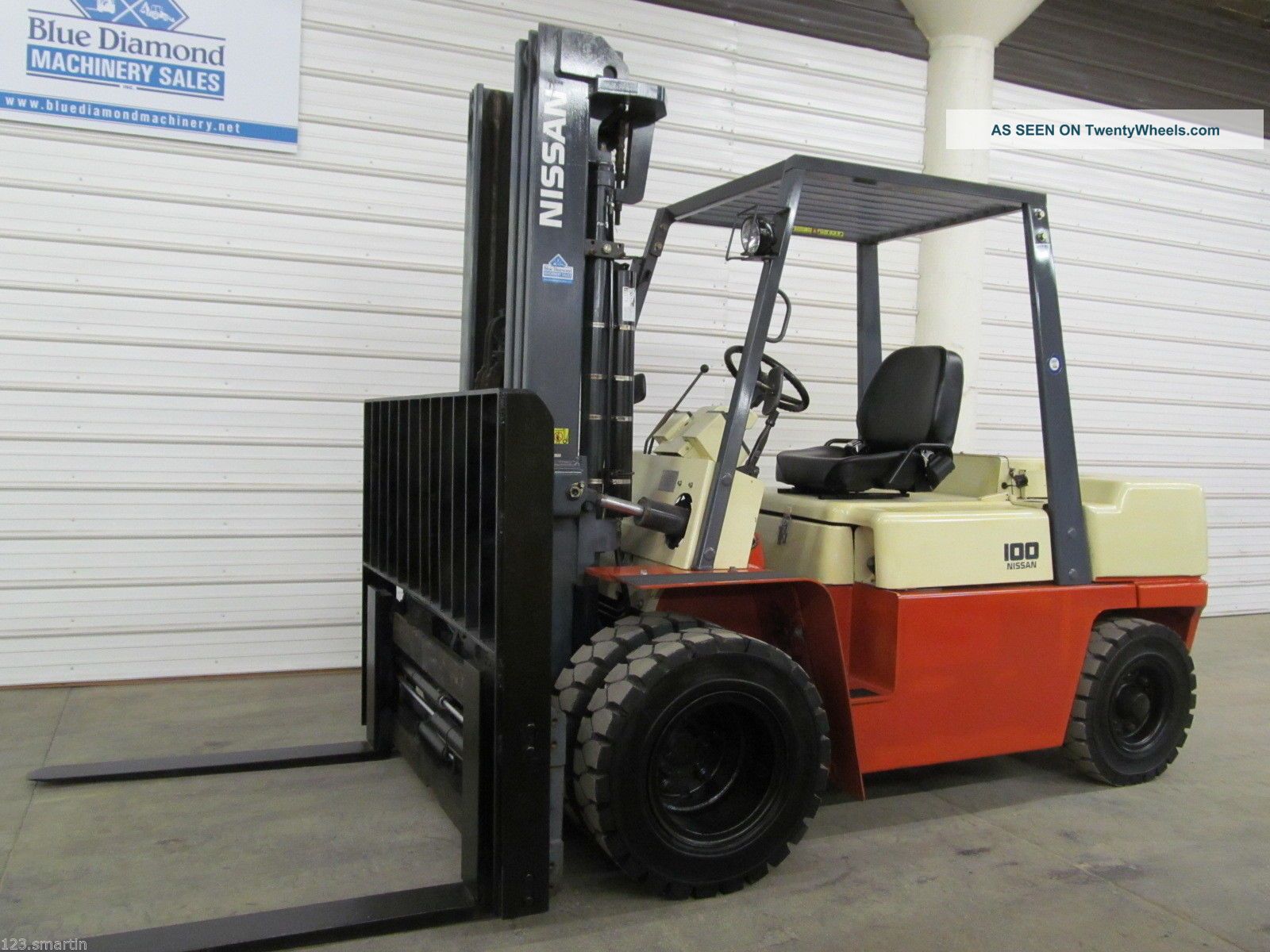 Nissan 10,  000 Diesel Forklift,  Pneumatic,  Triple,  Sideshift,  Fork Positioners Forklifts photo