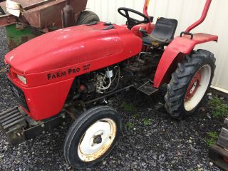 2003 Farm Pro 2420 Diesel Compact Tractor 3pt,  Pto Rubber,  Front Weights photo