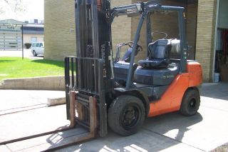 Toyota Pneumatic Forklift.  2012 Three Stage Fork Lift Truck photo