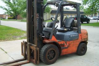 Toyota Forklift.  2006 Pneumatic Fork Lift Truck. ,  Three Stage Mast photo