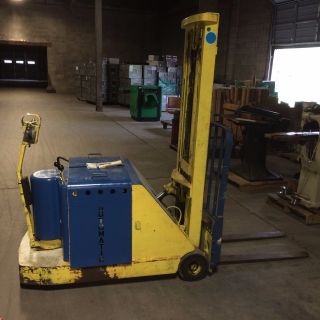 Electric Stand Behind Fork Lift 2,  500 Lb Capacity W/ Battery Charger photo