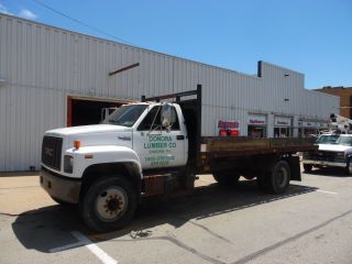 1995 Gmc C - 6500 Dumping Flat Bed Construction Lumber Truck photo