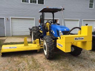 Holland Tn60a Tractor With Motrim Side Mowers photo
