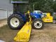 Holland Tn60a Tractor With Motrim Side Mowers Tractors photo 1