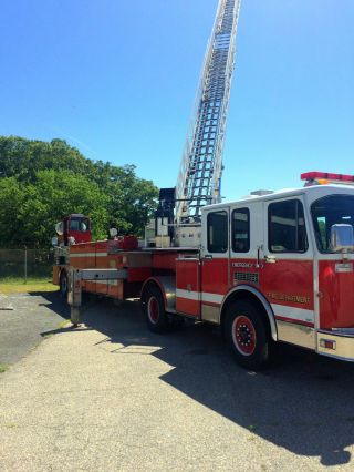 1990 Spartan Hook Ladder 110ft Reach Ladder Front And Rear Driving Staions photo