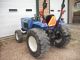 Holland T1520 4x4 Compact Tractor Tractors photo 1