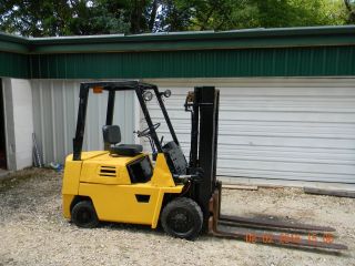 Komatsu Forklift,  With 5 ' Forks,  3 Stage,  Gas Runs Good Good Tires Good Brakes. photo