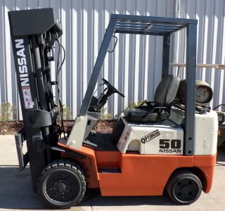 Nissan Model Cpj02a25v (2003) 5000lbs Capacity Great Lpg Cushion Tire Forklift photo
