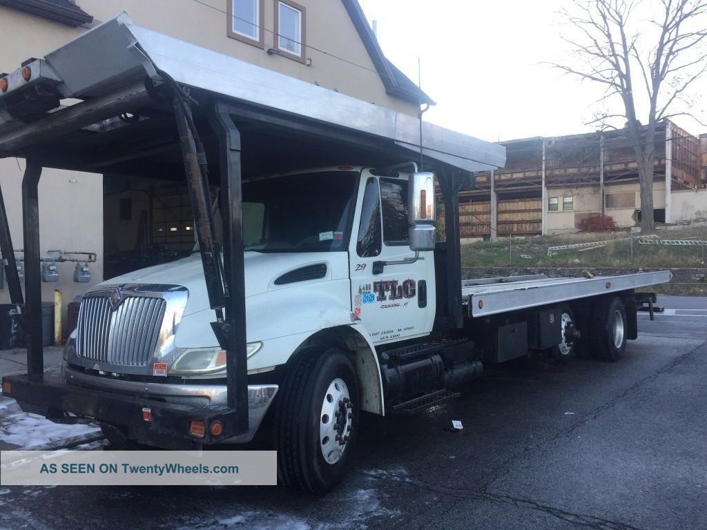 2003 International 4400 Flatbeds & Rollbacks photo