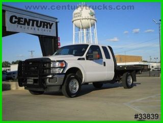 2014 Ford F250 4x4 Supercab Flat Bed photo