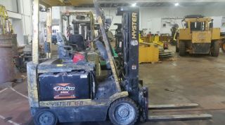 Electric Hyster Forklifts (2),  Batteries (2),  And Charger (1) photo