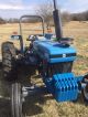 Holland 5610 S Tractor W/landpride Mower Deck,  Box Blade,  3 Point Auger Tractors photo 3