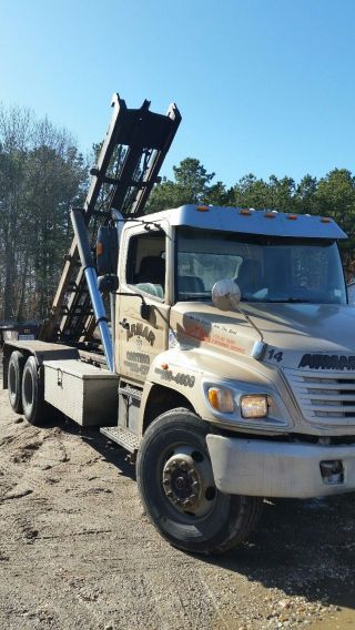 2005 Hino 338 Single Axle Roll Off Truck photo